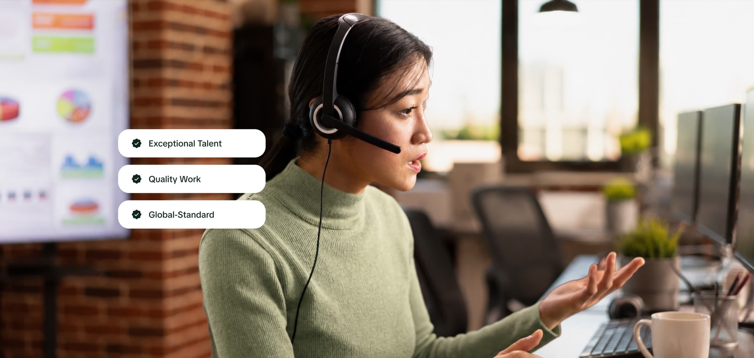 Springboard team member on a client call, with three highlights: Exceptional Talent, Quality Work, Global-Standard