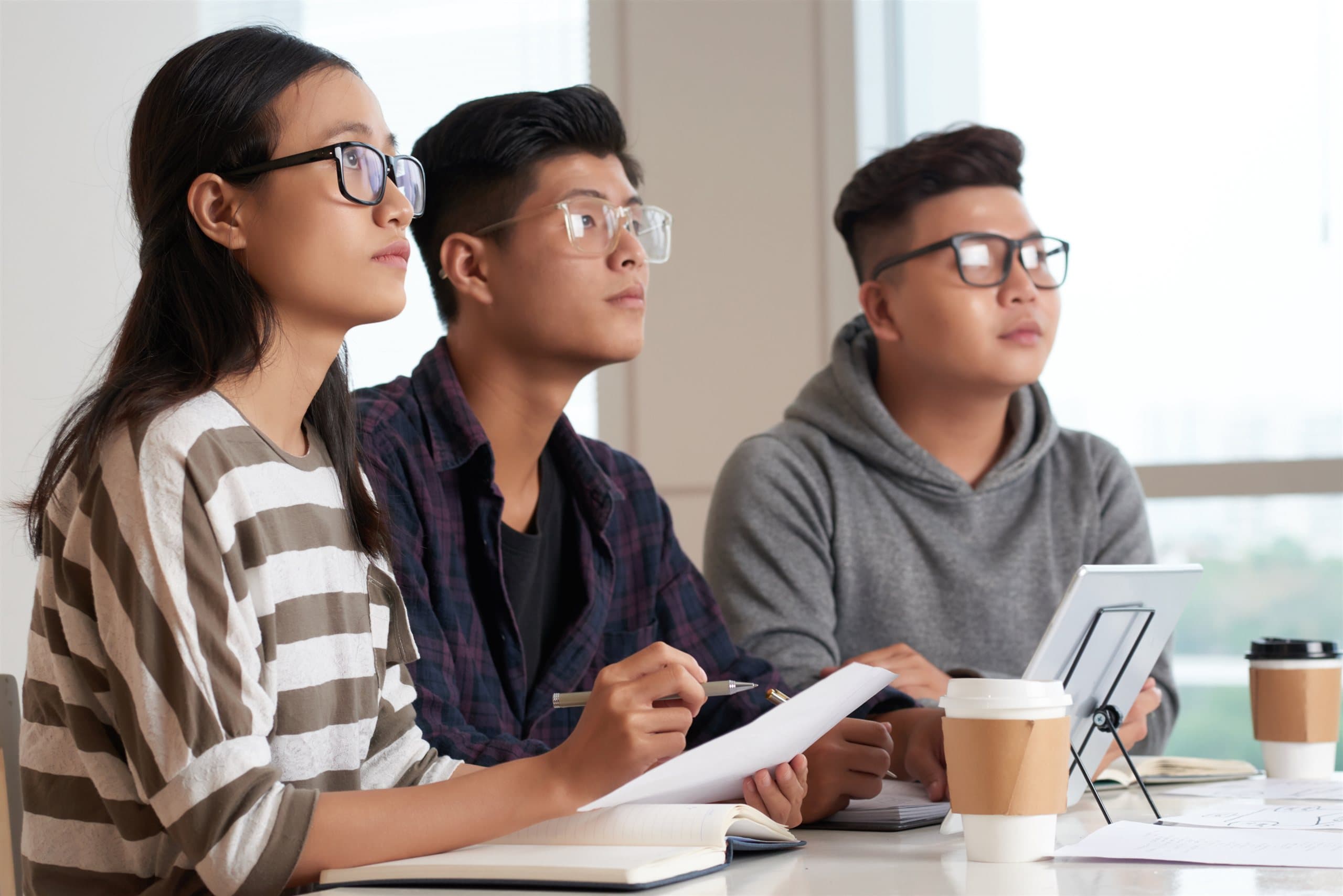 Interns working together at a table