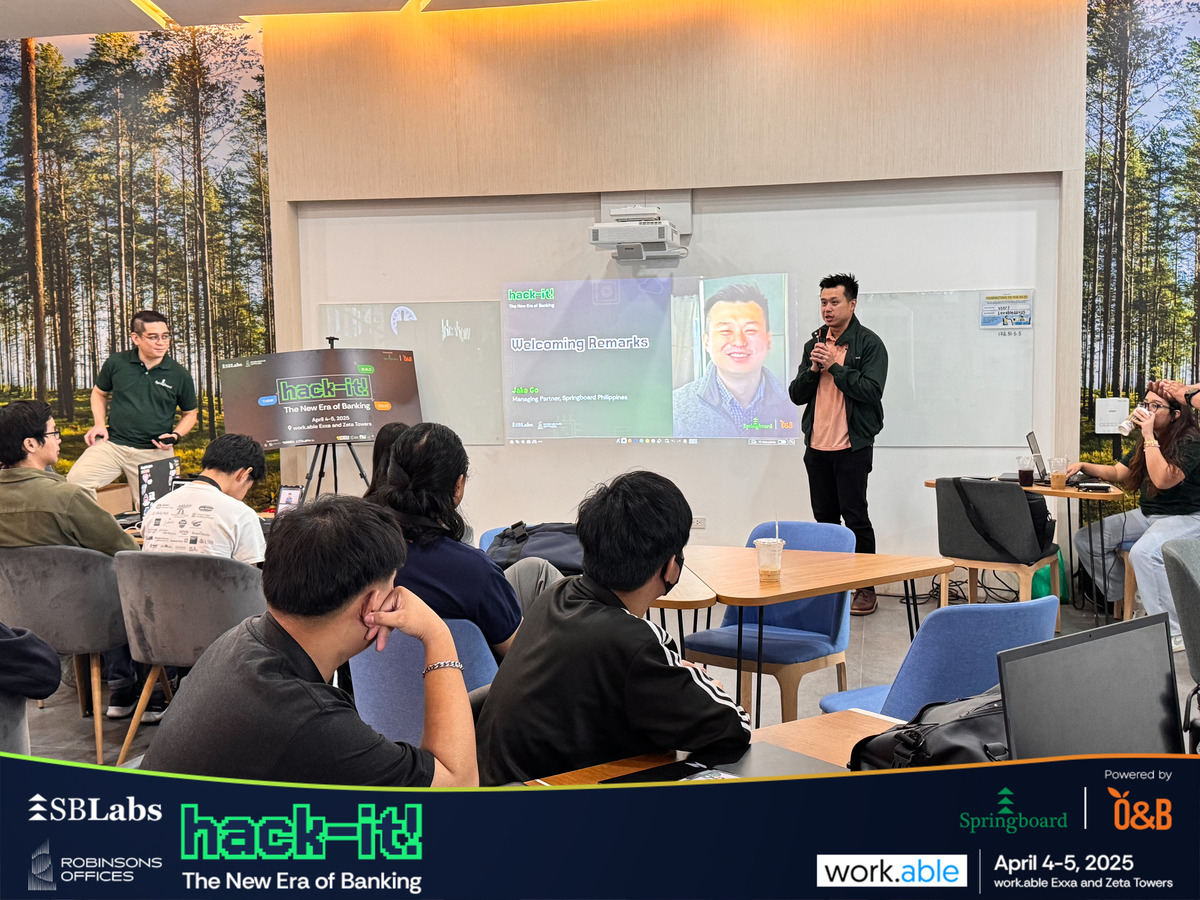 hack-it body 1.1 Jake Go addressing the audience at SpringboardLabs’ Hack-it! fintech innovation event.