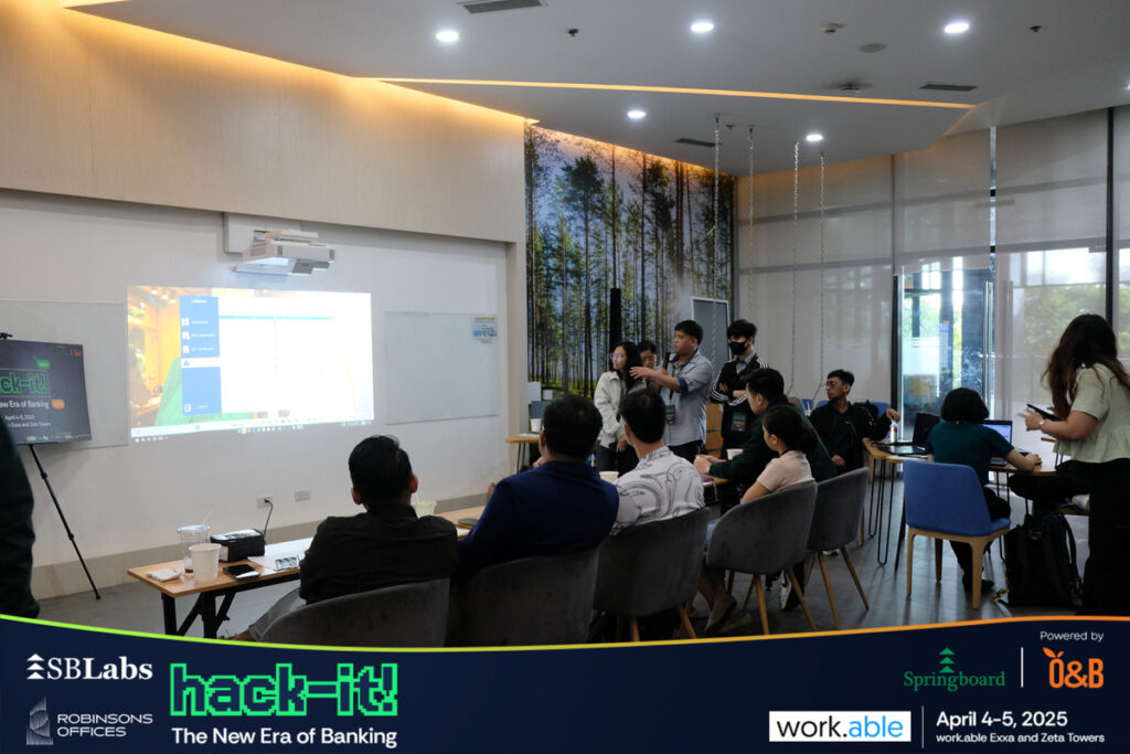 hack-it body 2.1 Participants engaging in discussion at hack-it! Hackathon.